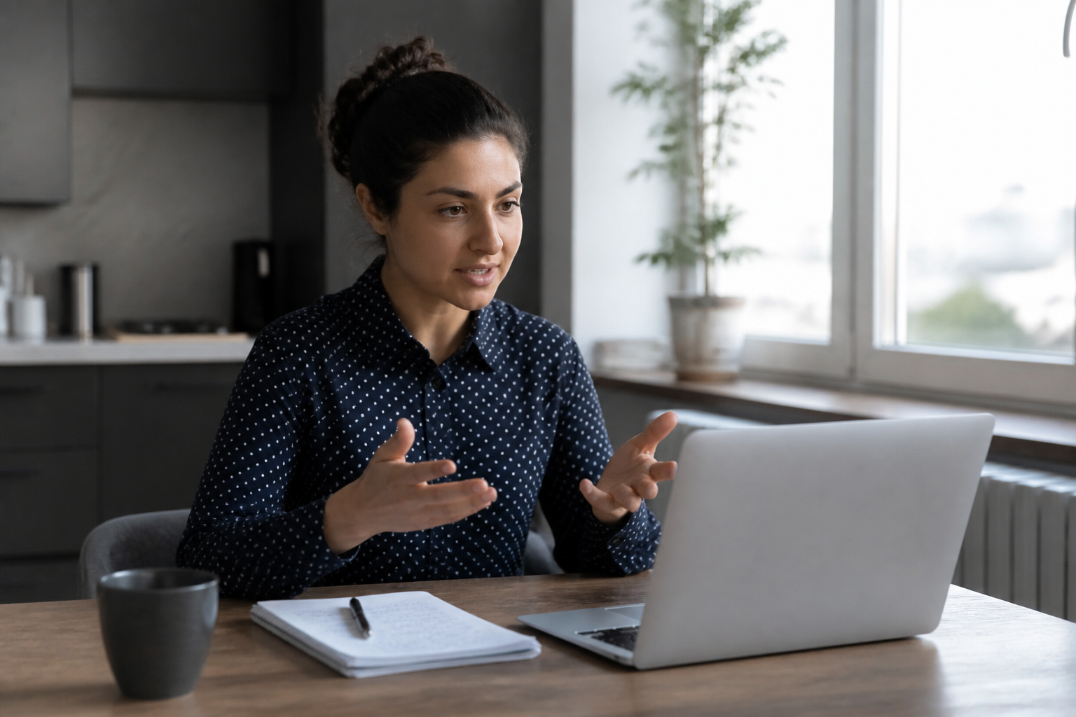 Adult rehearsing interview answers at home before a job interview